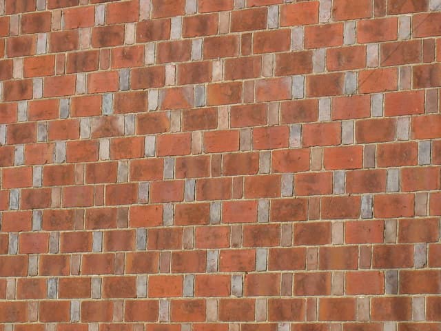 Cavity brick wall (Rat-trap bond), India (popularised by Laurie Baker)